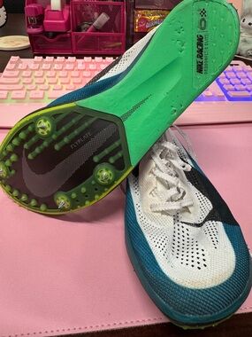 Nike Dragonfly 2 Elite. White, Teal & Black Lightweight track and field shoes.